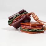 Bespoke Artisanal Leather Bag Charms | Premium Handbag Accents & Tags